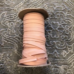 1/2 roll of a Freed Thin elastic ribbon /band